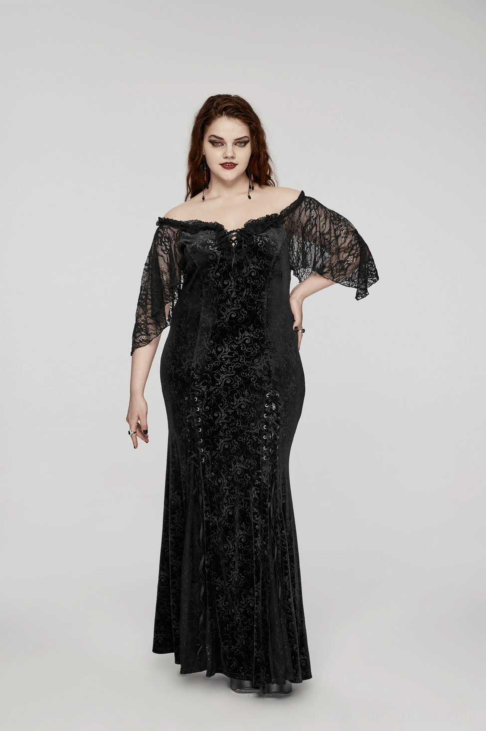Off-shoulder black velvet gothic dress detail, highlighting the combination of damask velvet fabric and intricate lace patchwork