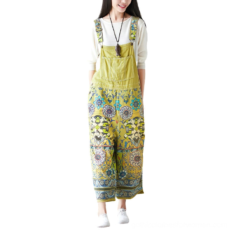 Olive green ethnic floral print wide-leg gothic pants full front studio shot with intricate botanical patterns