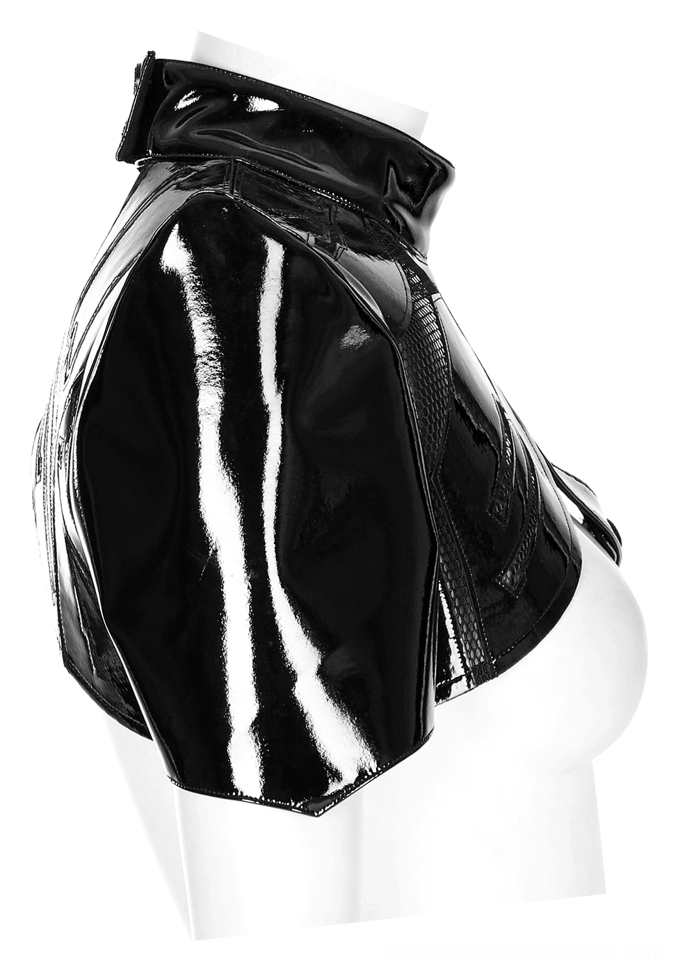 Three-quarter side view of black patent leather one-shoulder harness displaying structured shoulder cap and crossbody design