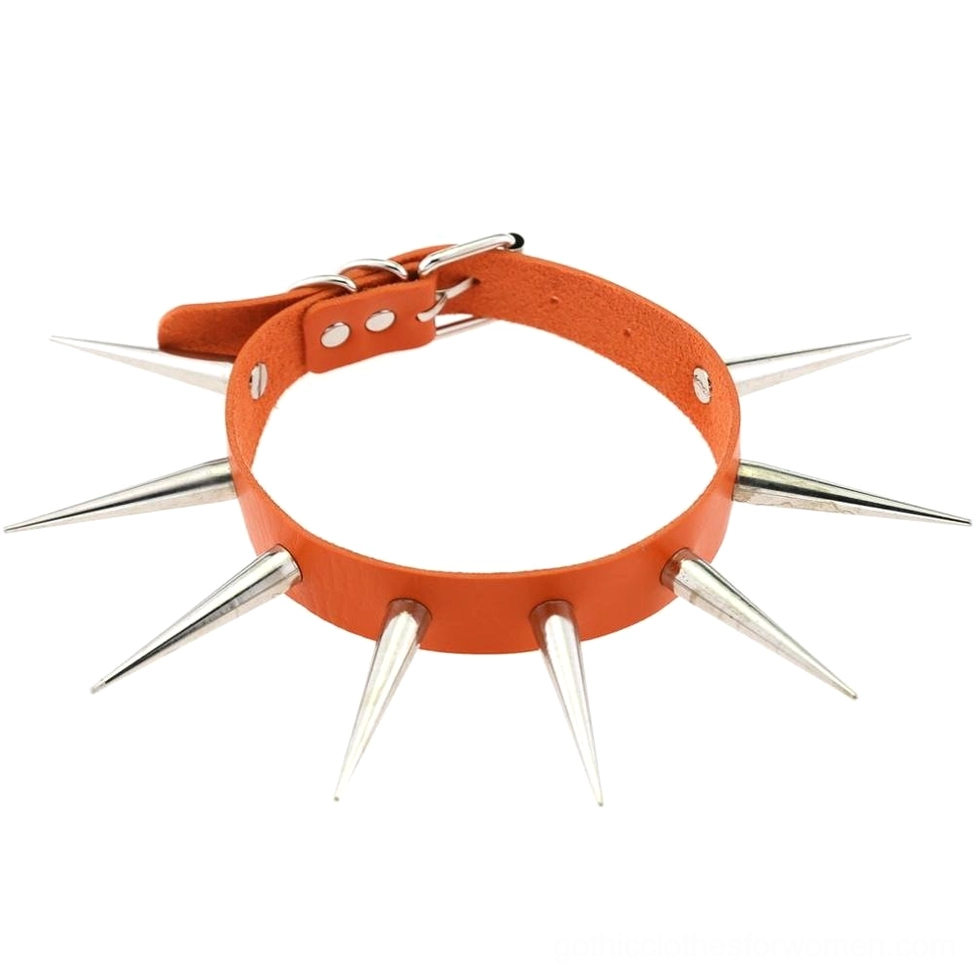 Orange faux leather studded gothic choker with metal spikes flat lay display on white background vibrant color