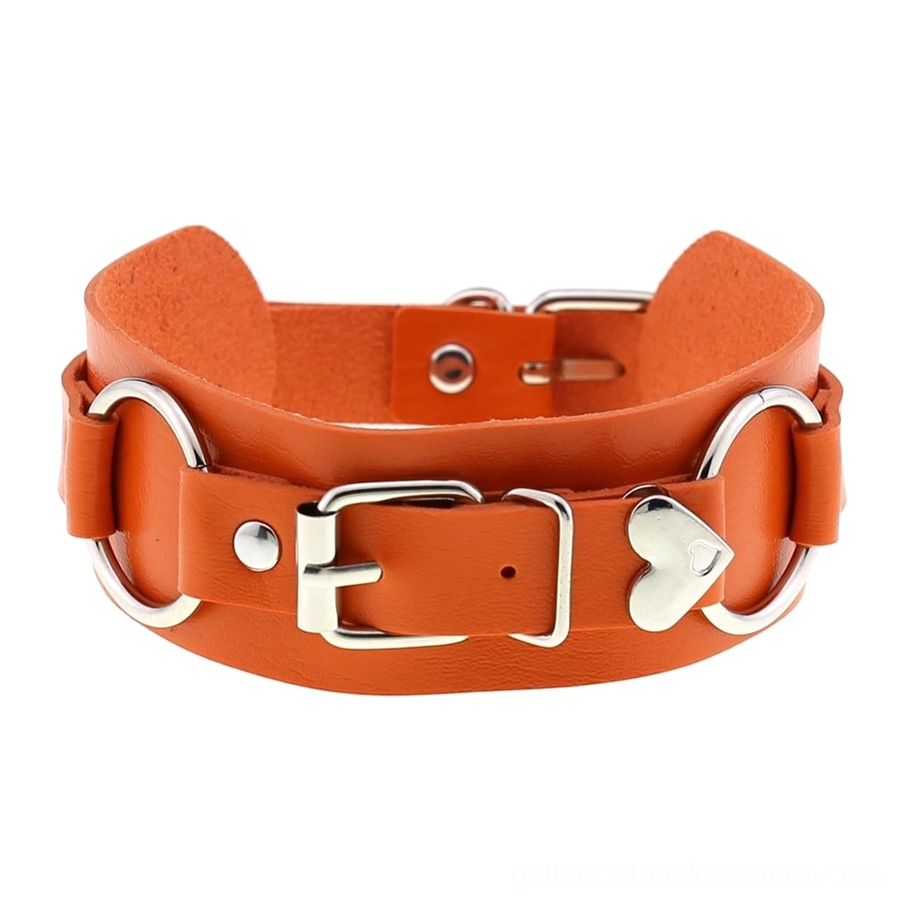 Orange leather choker with silver metal fittings and adjustable heart pendant feature
