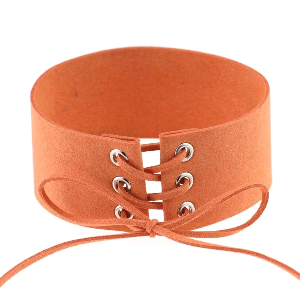 Orange lace-up velvet choker with cross lace hardware detail, vibrant gothic style