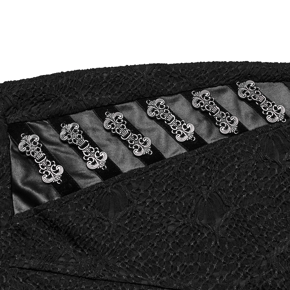 Ornate silver metal buckle detail with striped satin backing on gothic leggings, featuring scroll-shaped hardware
