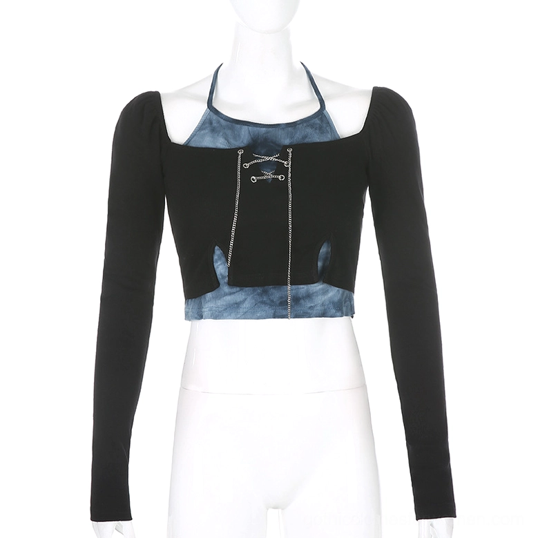 Black and tie-dye patchwork crop top on mannequin, front view showing two-piece construction and lace-up chain design