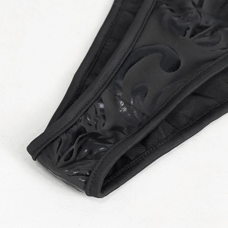 Black gothic pentagram bikini set flat lay showing cross-strap configuration and overall geometric design of the two-piece swimwear