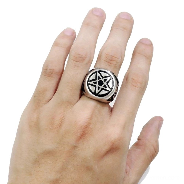 Pentagram ring worn on male right hand index finger front overhead view gothic jewelry