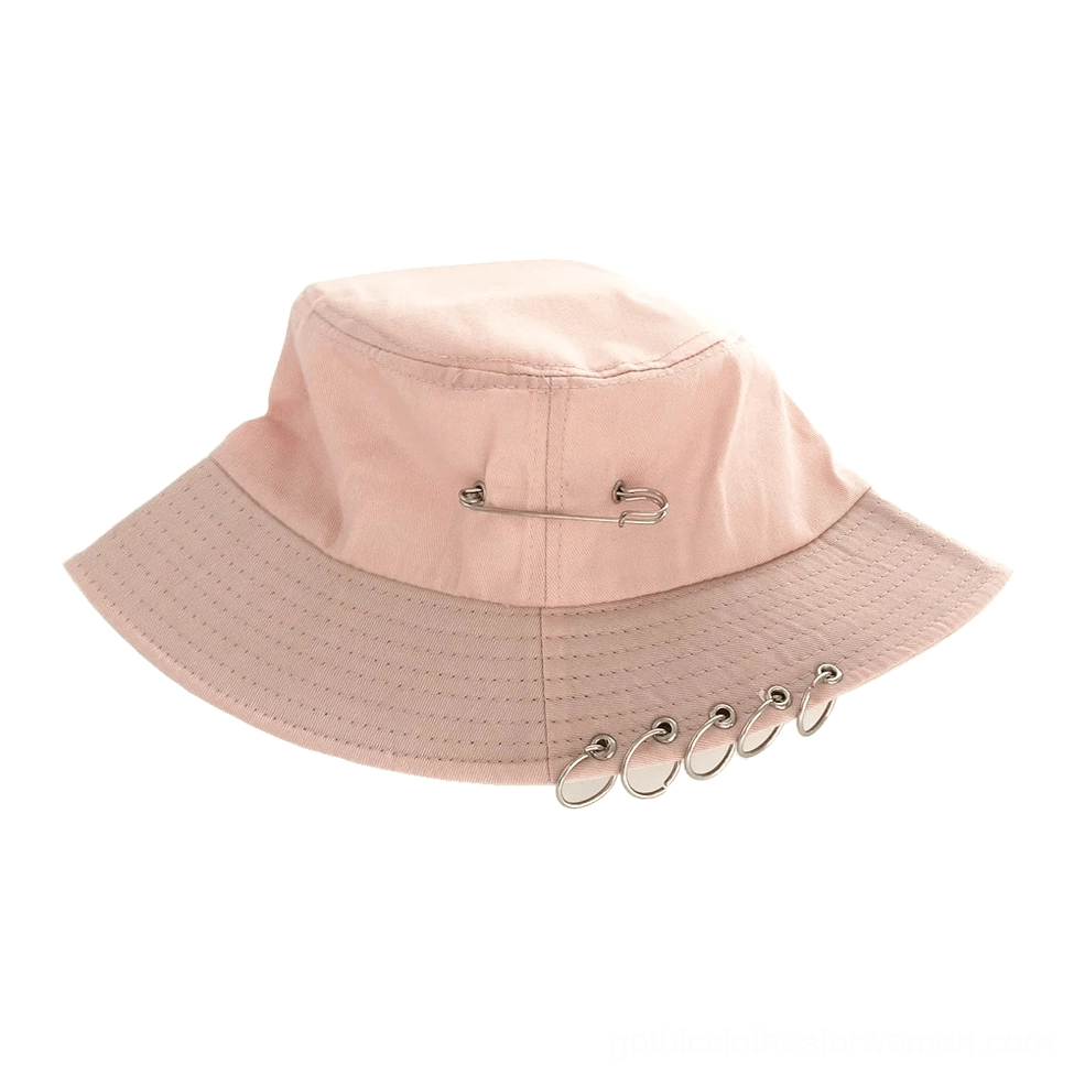 Pink gothic bucket sun hat with wide brim and silver metal ring decorations, side view angle