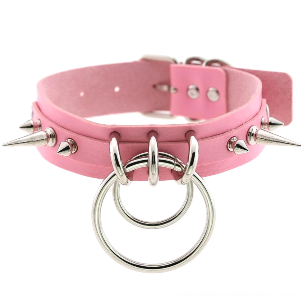 Pink spiked leather choker necklace with double O-rings, silver metal spikes, and adjustable buckle hardware