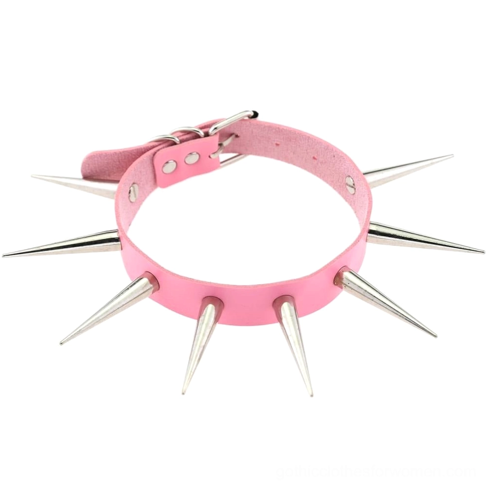 Pink faux leather spiked choker necklace with silver metal spikes arranged flat on white background romantic gothic