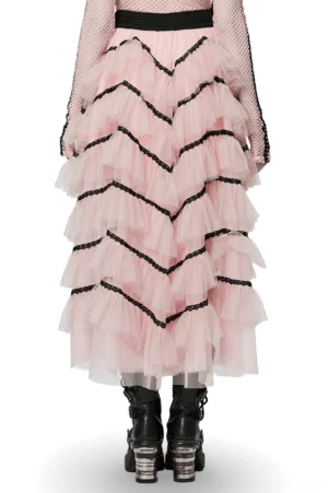Pink ruffled mesh midi skirt with black waistband and tiered tulle layers, worn with black platform boots, demonstrating full-length silhouette and gothic punk style