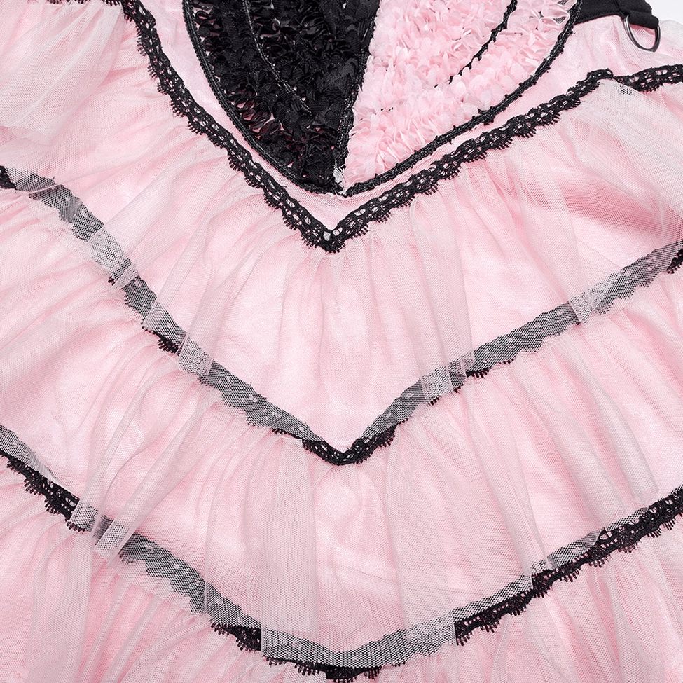 Ruffle and lace trim close-up of pink mesh skirt showing black lace trim edge and layered pink tulle construction detail