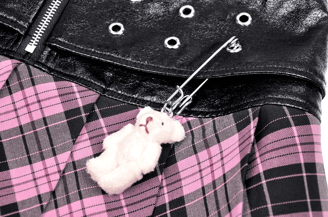 Gothic plaid skirt zipper and waistband close-up with glossy leather and teddy bear charm detail