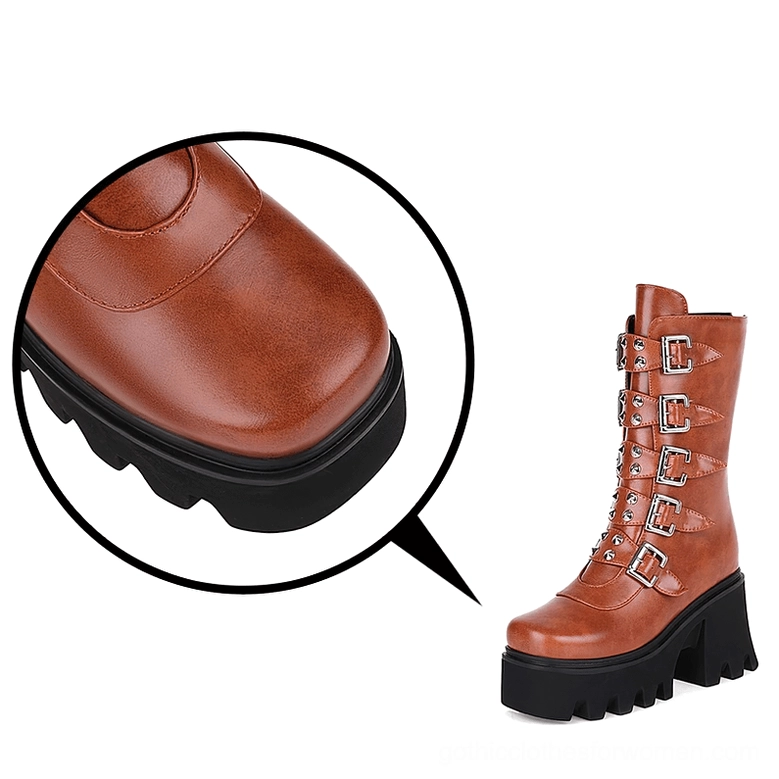 Platform combat boots close-up hardware detail silver buckles rivets and industrial elements