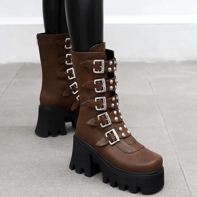 Platform combat boots sole view highlighting chunky lug rubber outsole and heel structure