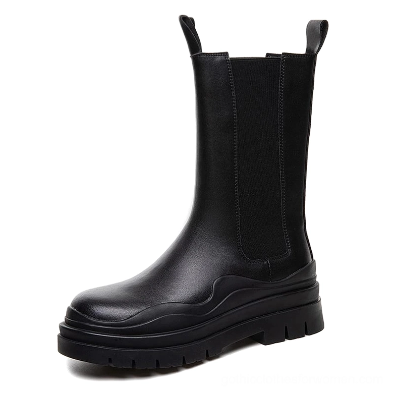 Side profile of black leather chunky platform boots with elastic closure and substantial sole height, showcasing gothic boot silhouette