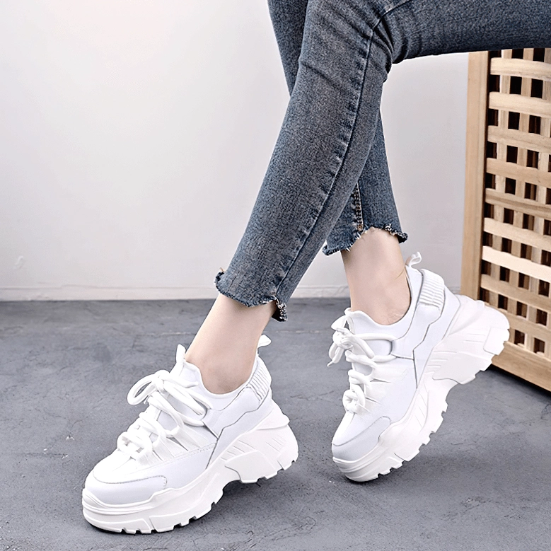 Women's chunky platform sneaker three-quarter view highlighting overall silhouette and proportions