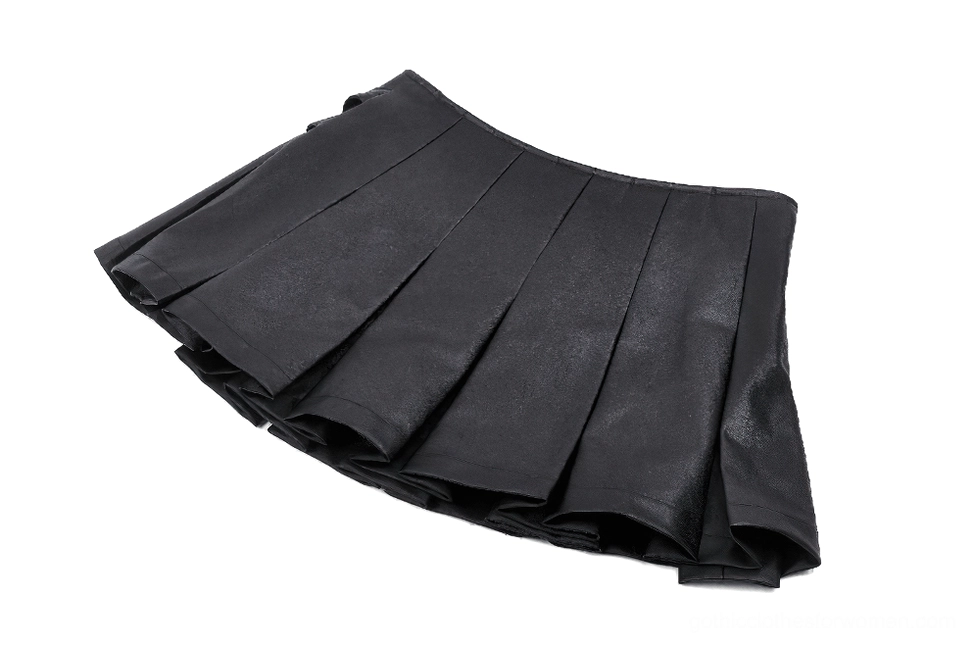 Side perspective flat lay of pleated faux leather gothic mini skirt displaying dimensional pleat layering and construction