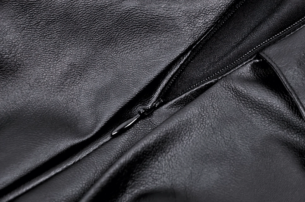 Pleated faux leather mini skirt full product view showing overall design, pleat precision, and gothic silhouette