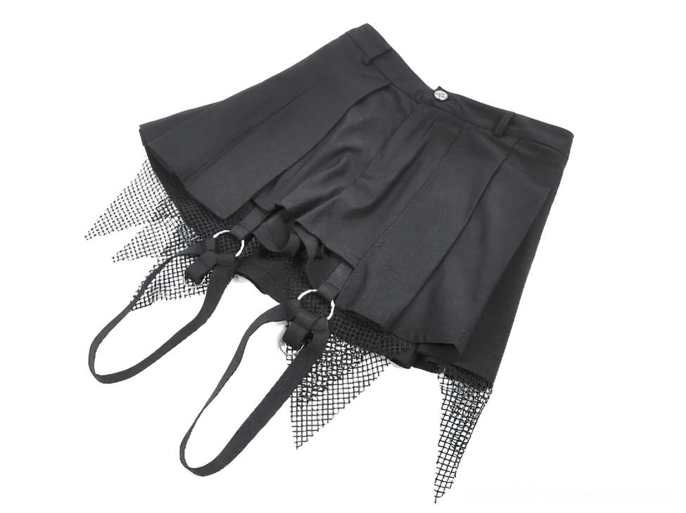 Pleated gothic mini shorts with mesh tassel thigh straps, angled flat lay view showing pleated texture