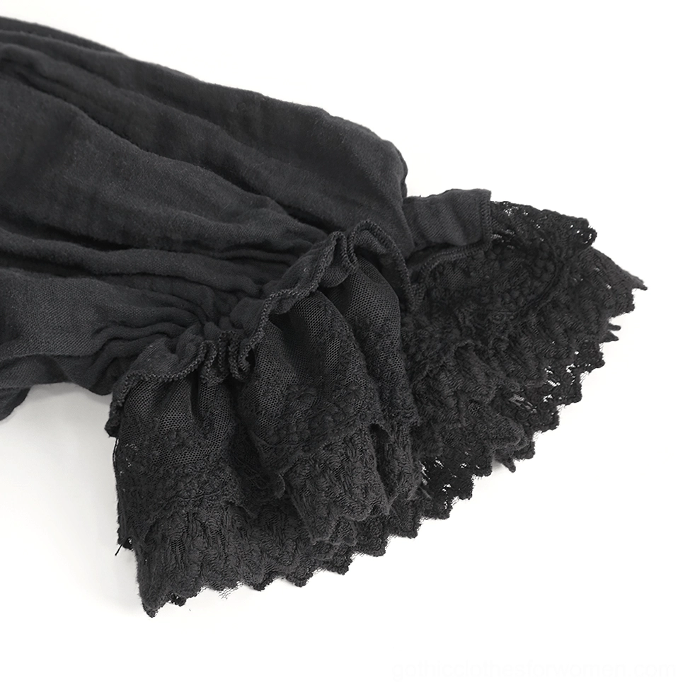 Puff sleeve cuff lace trim gathered detail close-up