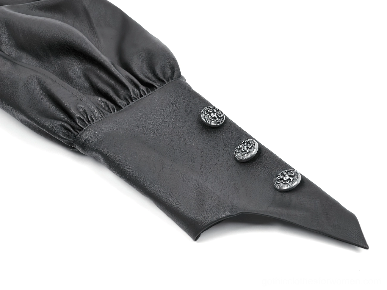 Close-up of punk gothic cape strap detailing and metal hardware, alternative fashion accessory