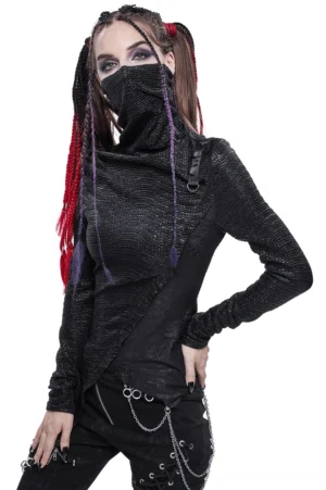 Woman wearing high collar asymmetrical punk gothic top with detachable face mask, front three-quarter view showcasing serpentine textured black fabric and pointed asymmetrical hem