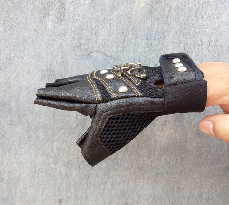 Punk rock style skull rivet half-finger gloves demonstrating versatile styling options