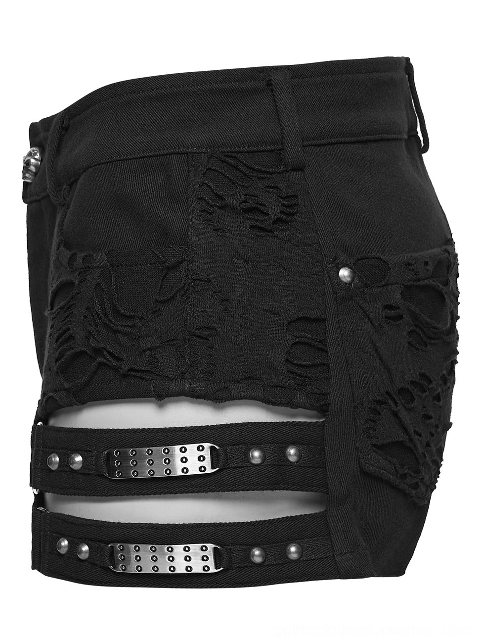 Side view of black punk denim shorts showing skull-embossed ripped fabric and studded adjustable buckles
