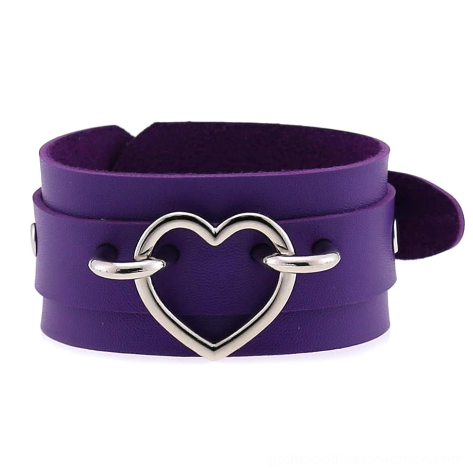 Dark purple leather heart cuff bracelet with silver heart buckle, goth alternative style front flat lay