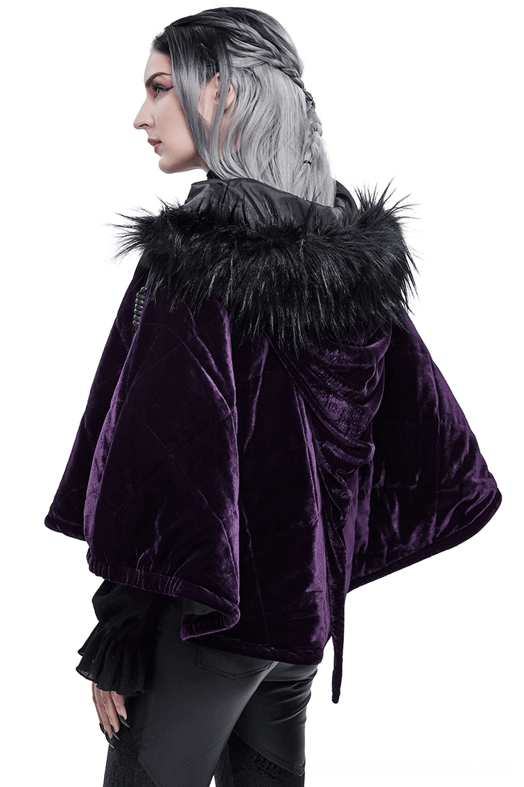 Side profile of gothic velvet cape on model highlighting padded quilted fabric and extended back hem drape