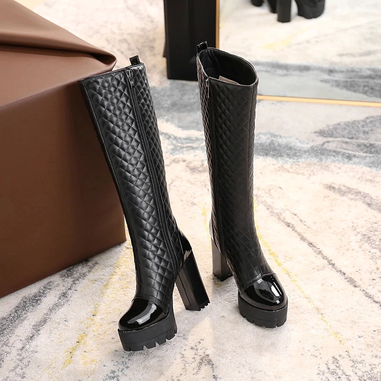 Detailed view of quilted diamond-stitch pattern on gothic platform boots upper