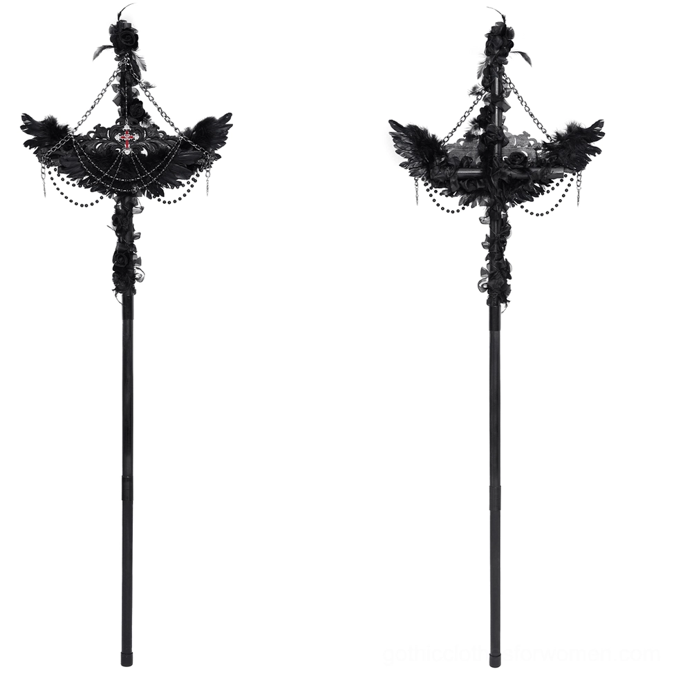 Front facing view of black raven cross gothic staff with feather details and beaded chain drapes on white background