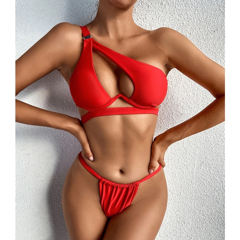 Red one-shoulder two-piece bikini with push-up padding and high-cut thong on model