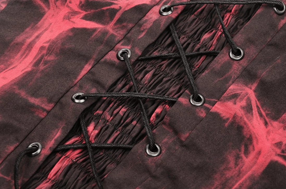 Red and black gothic corset top showcasing overall silhouette with ruching, metal accents, and tie-dye aesthetic
