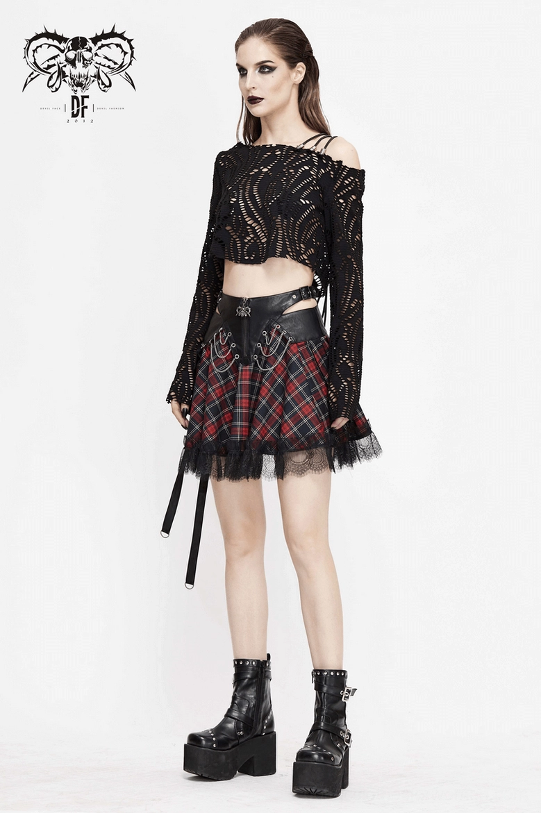Red and black gothic tartan plaid skirt 3/4 front view on model with cut-out waist and platform boots