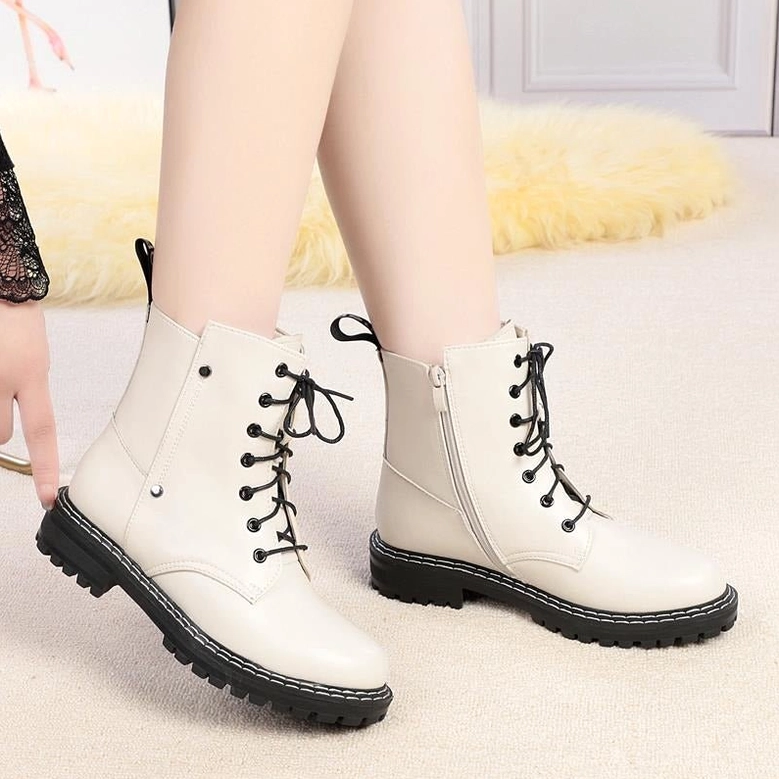 Red wool-lined combat boot interior showing plush insole and full wool lining coverage