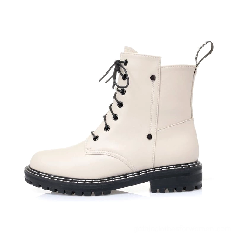 Red gothic combat ankle boot sole view showing rubber tread and platform construction