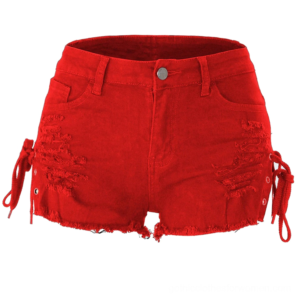 Red mini denim shorts with distressed ripping and side lace-up closure, front studio view