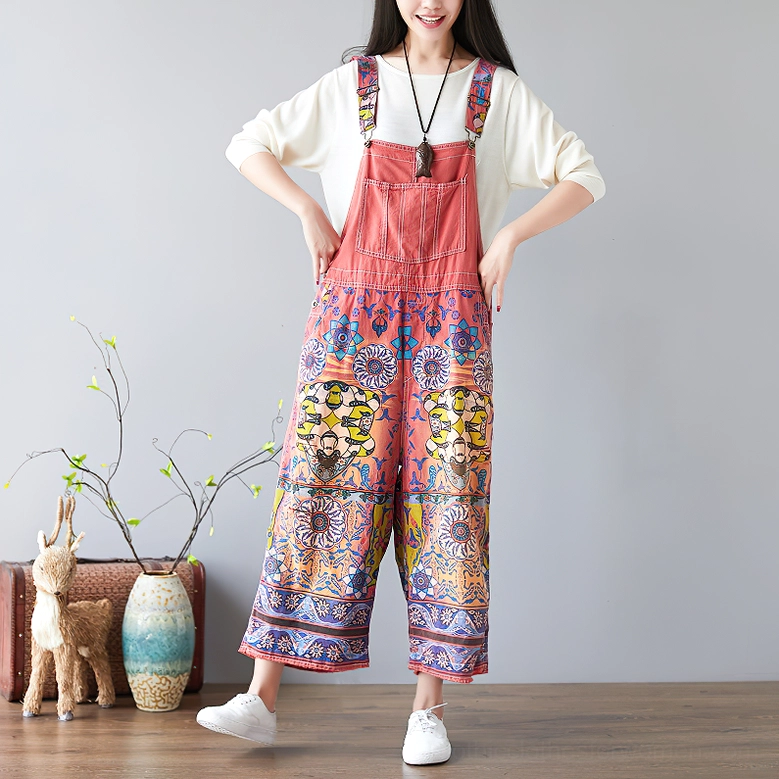 Crimson red psychedelic floral wide-leg gothic pants full side view with artistic home styling