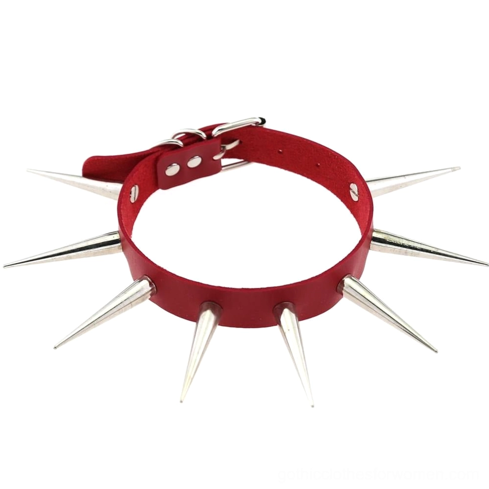 Bright red faux leather studded choker with metal spikes arranged flat on white background bold gothic style