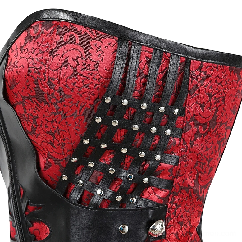 Close-up of red jacquard fabric corset side panel with black faux leather trim and studded lattice decoration