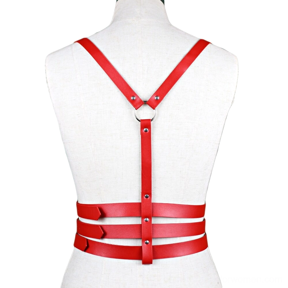 Red leather back harness on white mannequin, back view displaying central D-ring, rivet details, and triple waist strap configuration
