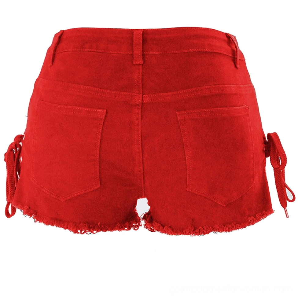 Red high-waist denim shorts with side lace-up and frayed hem, back view showing pockets