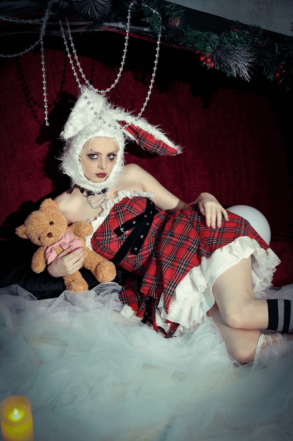 Red plaid corset dress full view highlighting punk-gothic aesthetic and alternative fashion style
