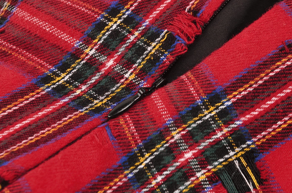 Red plaid corset dress texture and pattern detail showcasing quality of tartan fabric construction