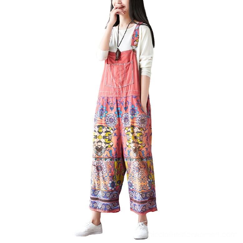 Crimson red floral print wide-leg gothic pants three-quarter side view showing cropped silhouette