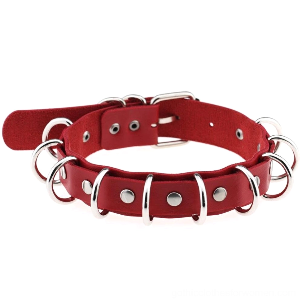 Red faux leather choker with silver metal ring embellishments, punk rock aesthetic