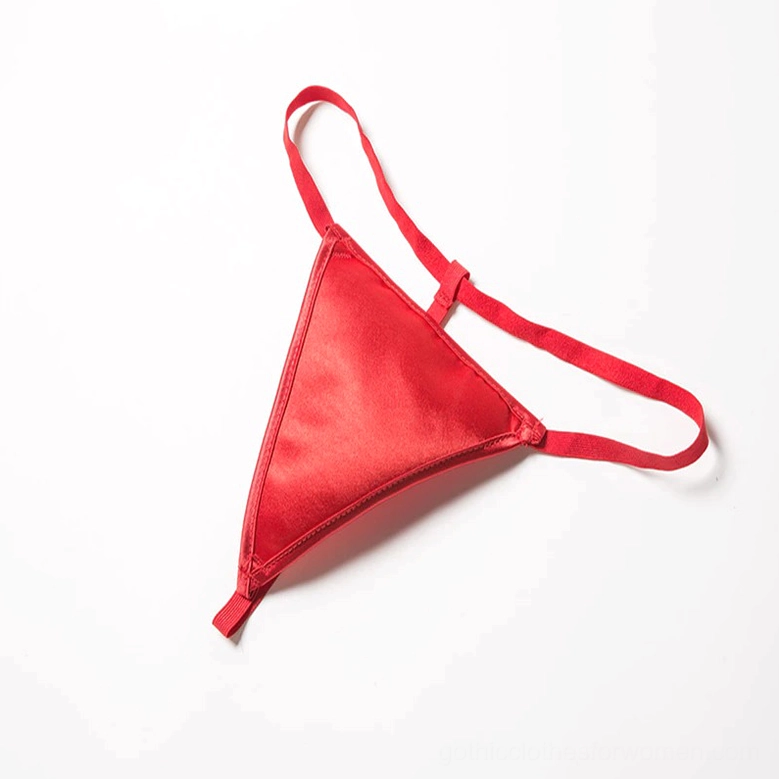 Red satin g-string thong included with gothic corset set - flat lay product shot showing thin elastic straps