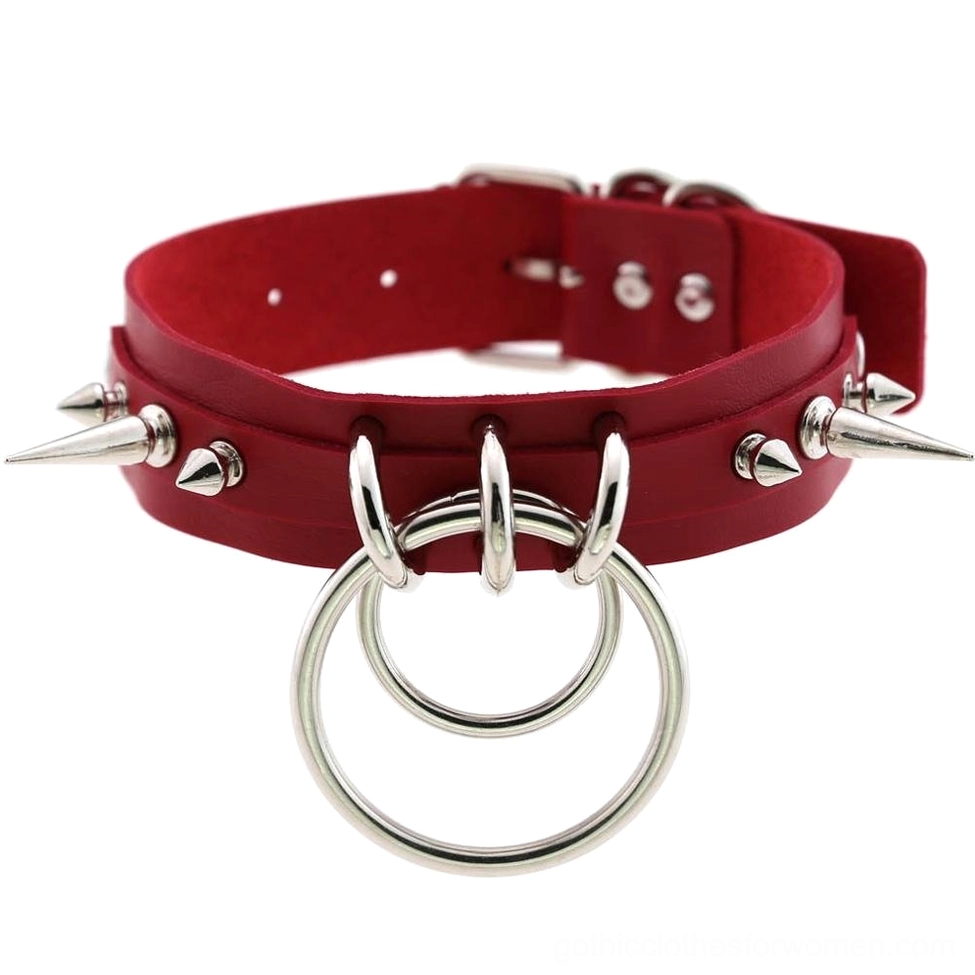 Red spiked leather choker with double O-rings, silver metal spike studs, and adjustable metal buckle closure