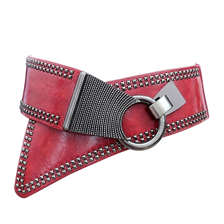 Bright red faux leather studded wide belt with silver round metal buckle, flat lay front view for gothic rock fashion